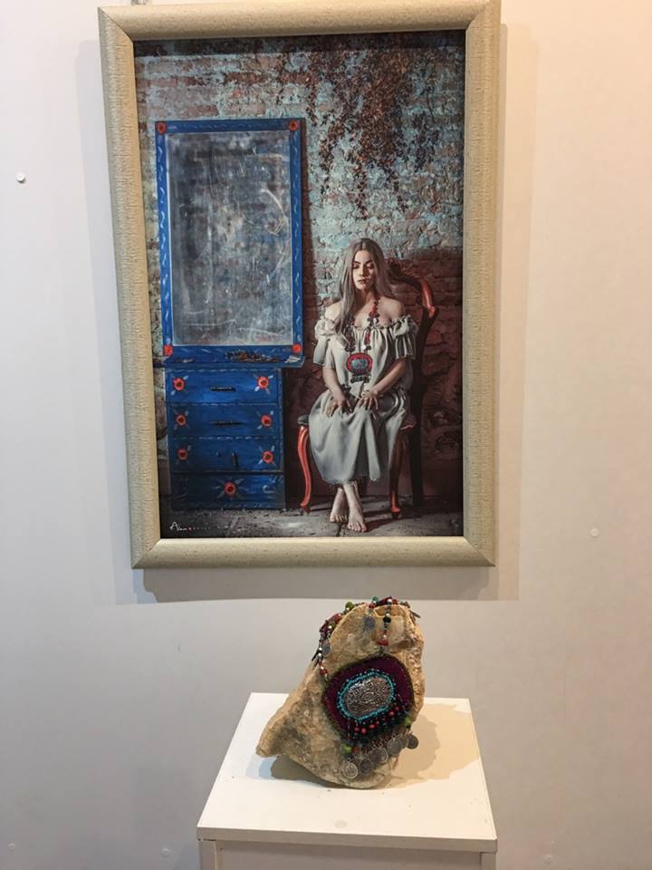 Modern artwork depicting traditional Kurdish folkore is currently on display in Erbil's Media Hall. (Photo: Kurdistan 24)